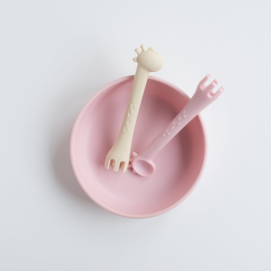 les enfants silicon bowl that sticks to surface and giraffe spoon fork duo eating collection teething toy pink and sand