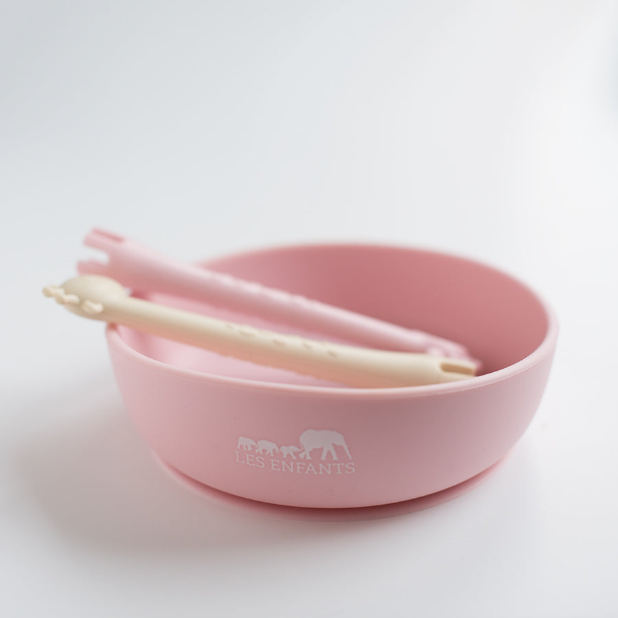 les enfants silicon bowl that sticks to surface and giraffe spoon fork duo eating collection teething toy pink and sand logo showing